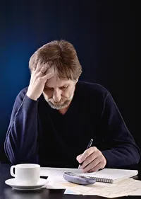 Senior working at a desk