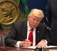 Trump thinking very hard as he tries to remember how te spell his name